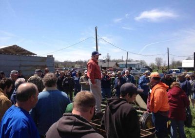 Auctioneer selling farm equipment