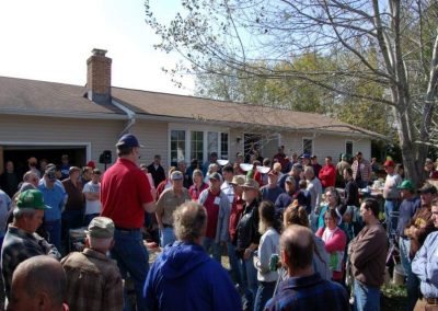 Photo of auctioneer Michael Hoffman selling house