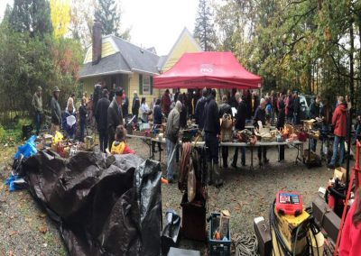 Auction taking place in rain